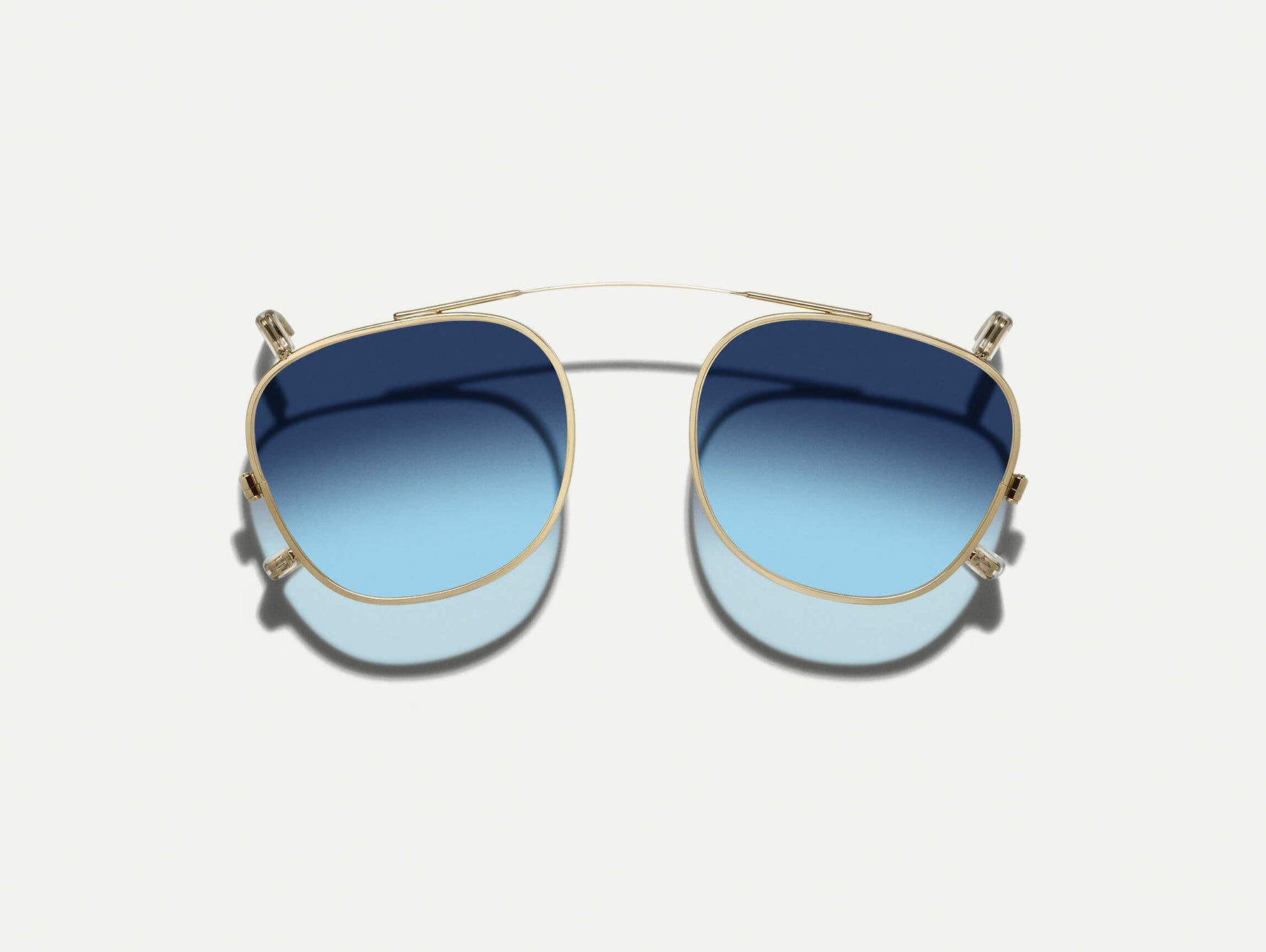 #color_denim blue | The DAHVEN CLIP in Gold with Denim Blue Tinted Lenses