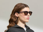 Model is wearing The DOLT in Burgundy in size 49 with AMBER+ Lenses