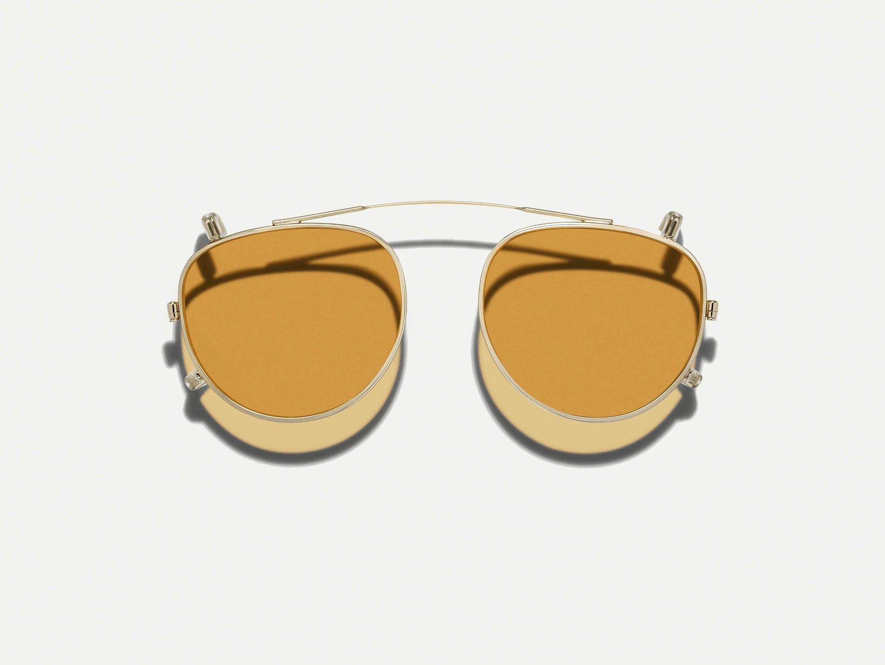 #color_amber | The MAYDELA CLIP in Gold with Amber Tinted Lenses