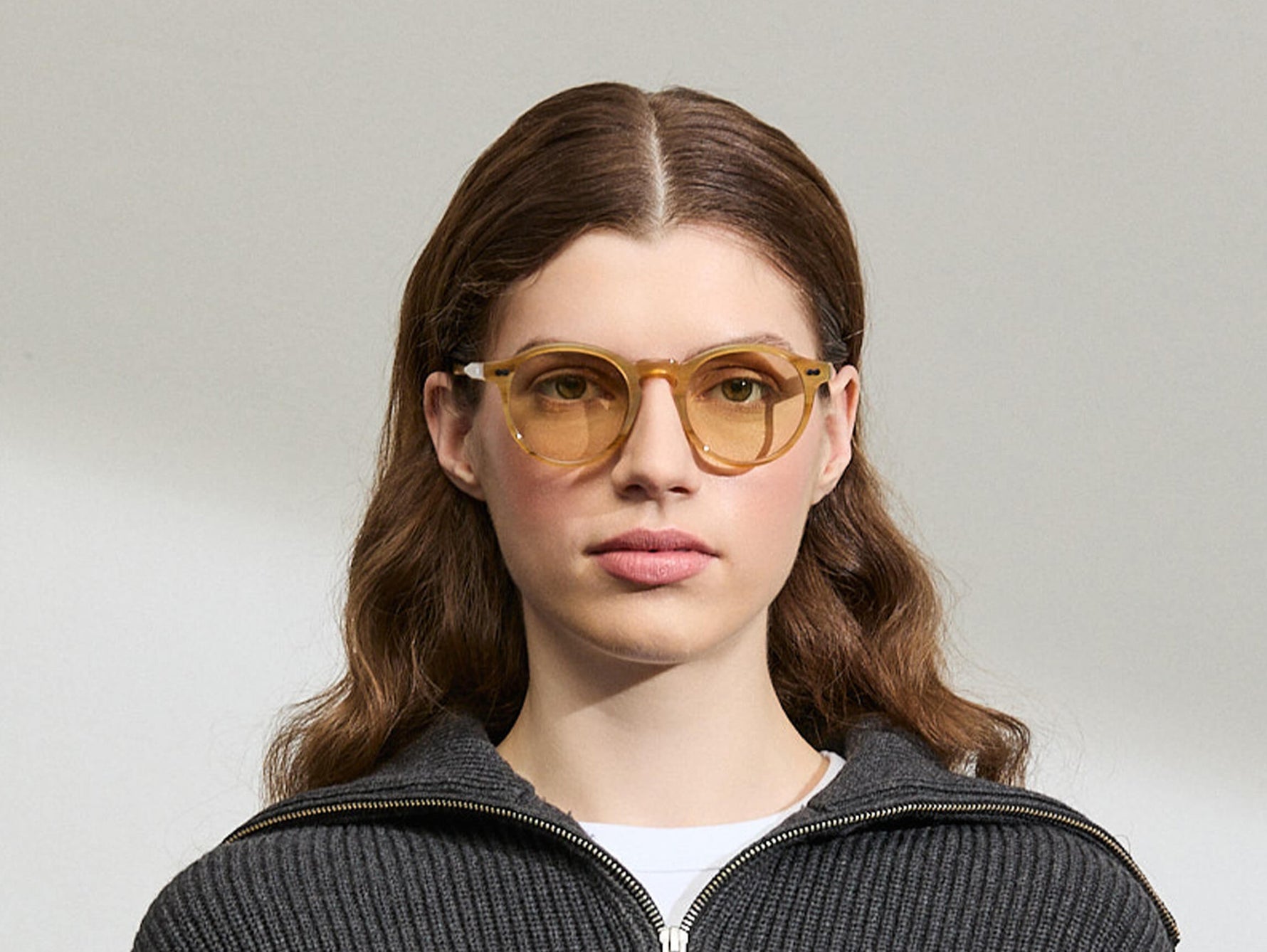 Model is wearing the MILTZEN in Blonde in size 49 with AMBER+ Lenses