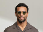 Model is wearing The MILTZEN in Citron/Tortoise in size 46 with GREEN+ Lenses