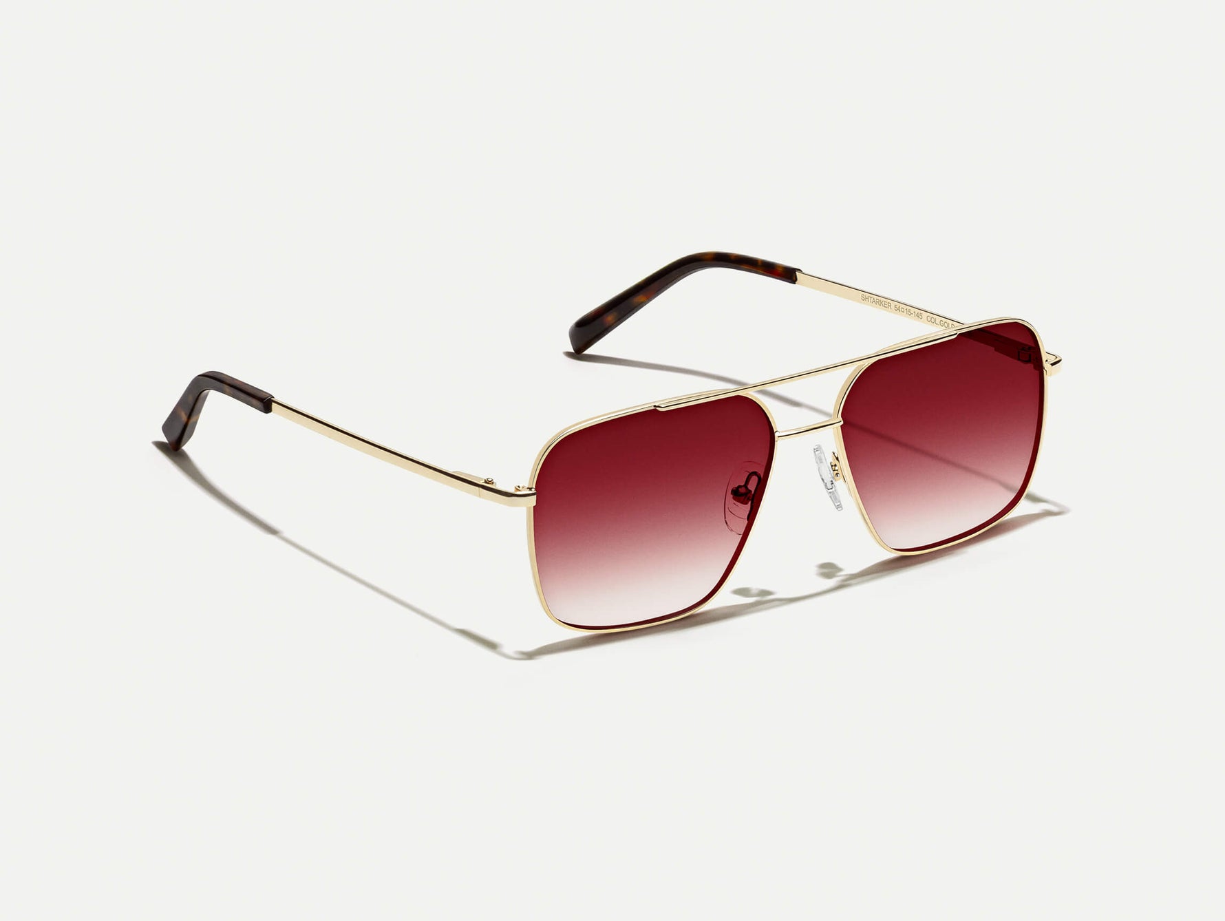 The SHTARKER in Gold with Big Apple Fade Tinted Lenses