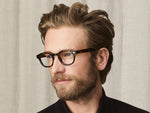 Model is wearing The LEMTOSH with Blue Light Filter in size 46 in Tortoise