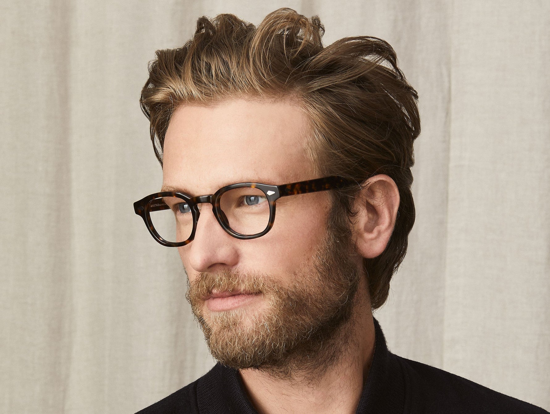Model is wearing The LEMTOSH with Blue Light Filter in size 46 in Tortoise