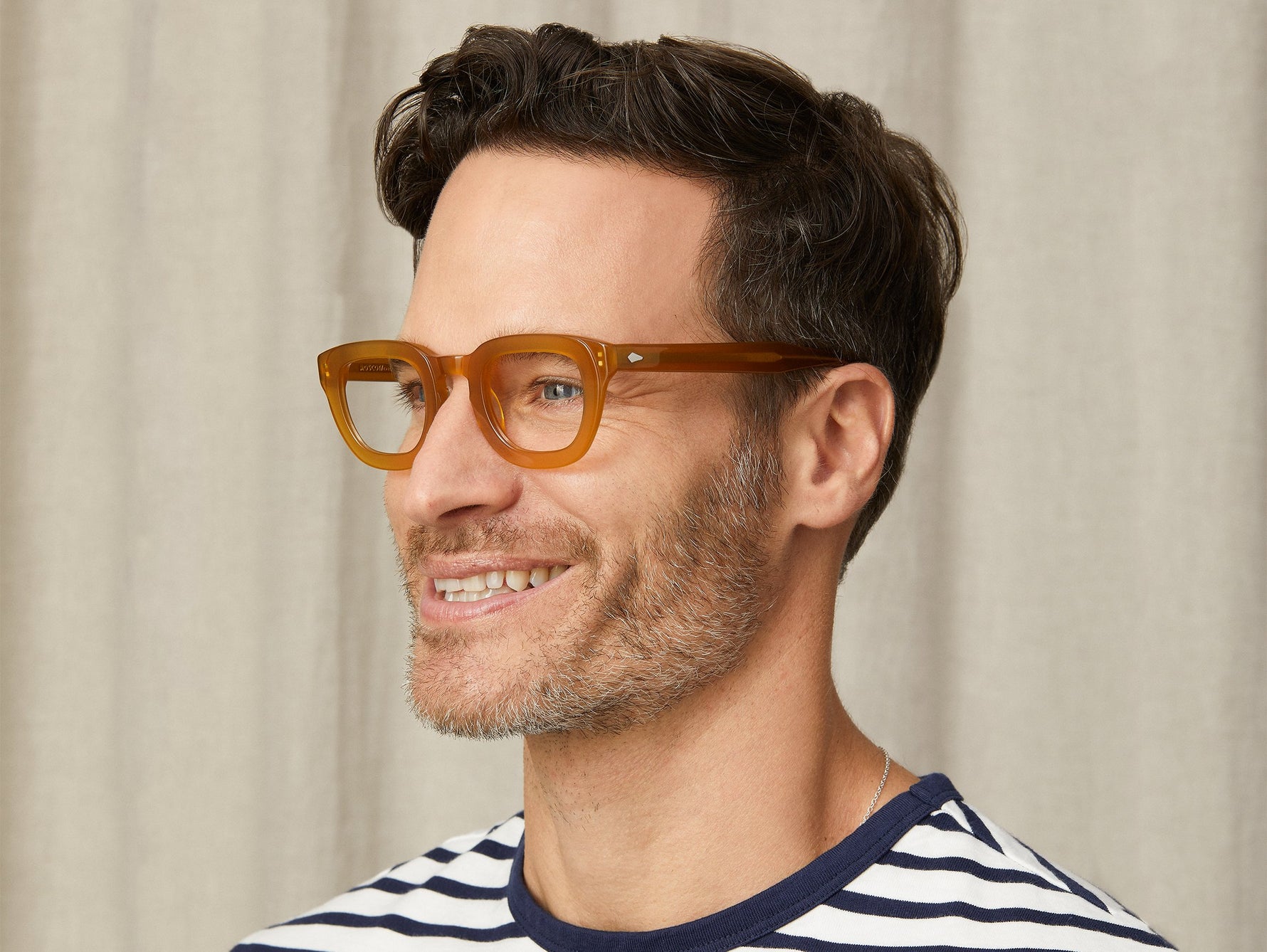 Model is wearing The TELENA in Butterscotch in size 44 with Blue Protect Lenses