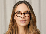 Model is wearing The ZOLMAN in Classic Havana in size 42 with Blue Protect Lenses